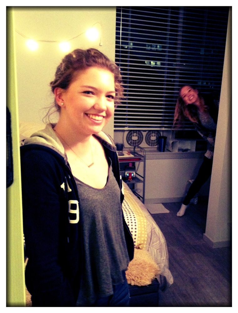 Ella, at the door of her new micro-apartment in Portland (with a ghost peaking in the background).